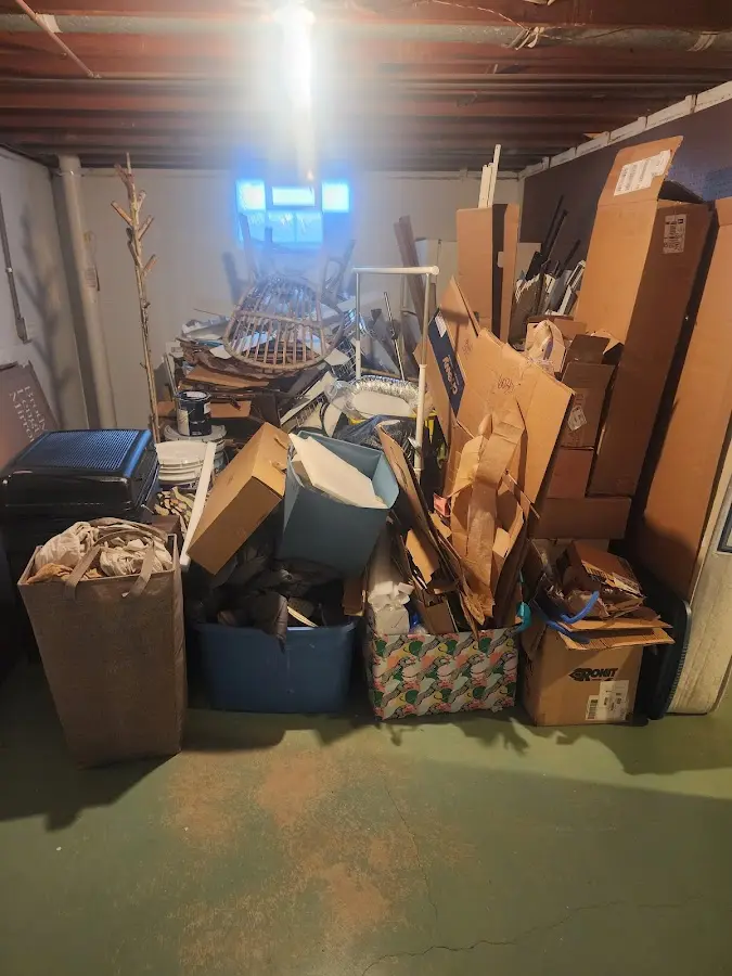 Roll-off dumpster container at job site for 8 Yard Dumpster Rental in Rockfish